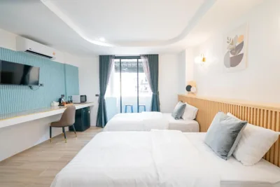 R202 - Standard-Zweibettzimmer mit Patio — Phunaya Phuket Oldtown Hotel