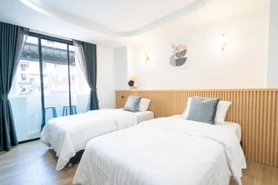 R402 - Standard-Zweibettzimmer mit Patio — Phunaya Phuket Oldtown Hotel